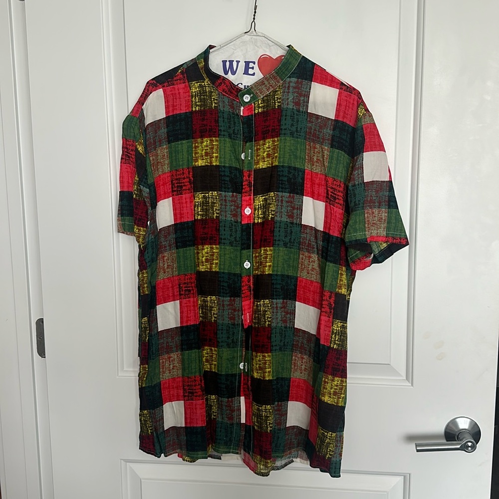 Men’s Button down T shirt.